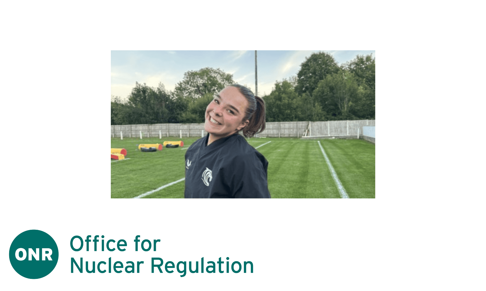 Photo of Grace on a rugby field
